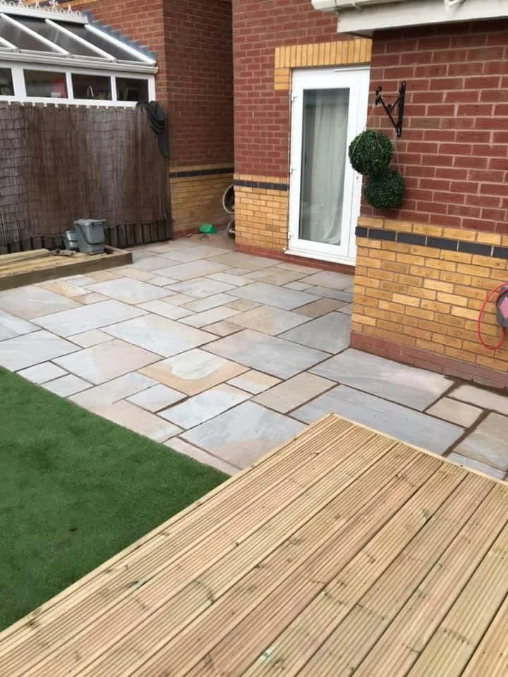 Paved patio beside timber decking